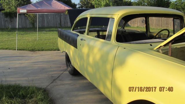 Yellow 1957 Chevrolet Bel Air/150/210