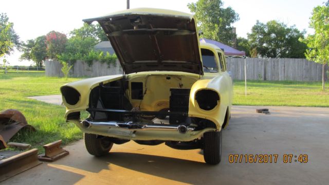 Yellow 1957 Chevrolet Bel Air/150/210