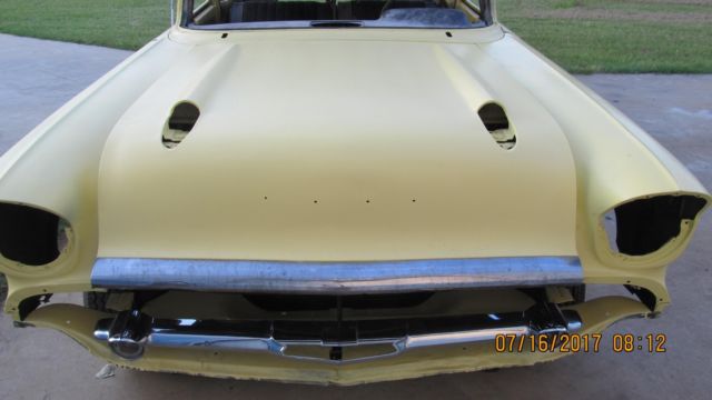 Yellow 1957 Chevrolet Bel Air/150/210