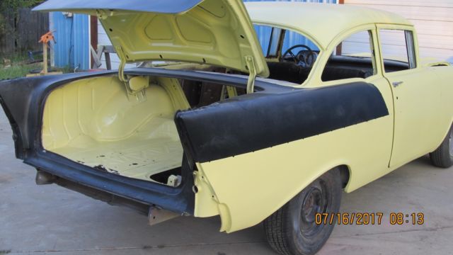 Yellow 1957 Chevrolet Bel Air/150/210