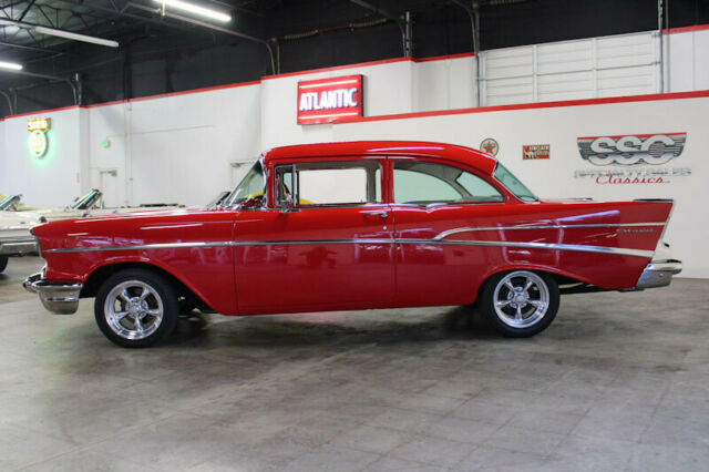 Red 1957 Chevrolet Bel Air/150/210 Sedan with Red interior
