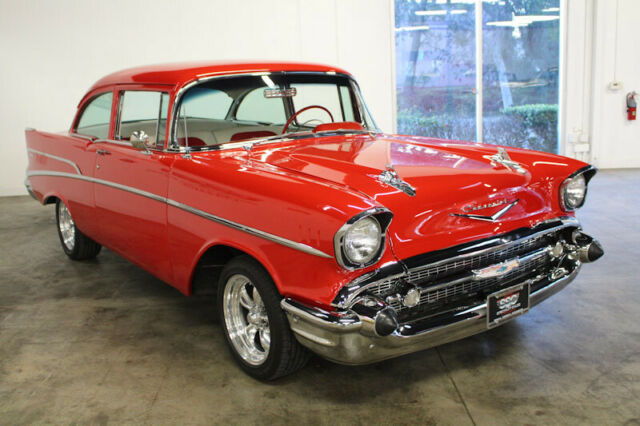 Red 1957 Chevrolet Bel Air/150/210 Sedan with Red interior