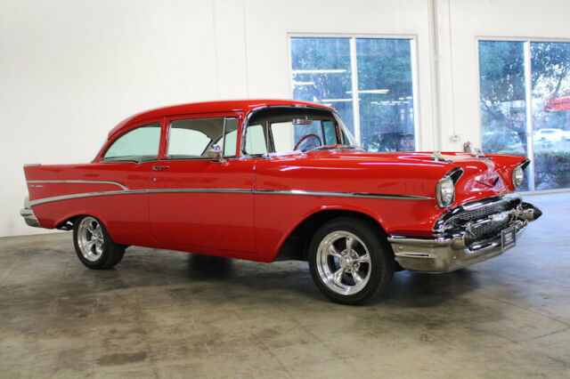 Red 1957 Chevrolet Bel Air/150/210 Sedan with Red interior