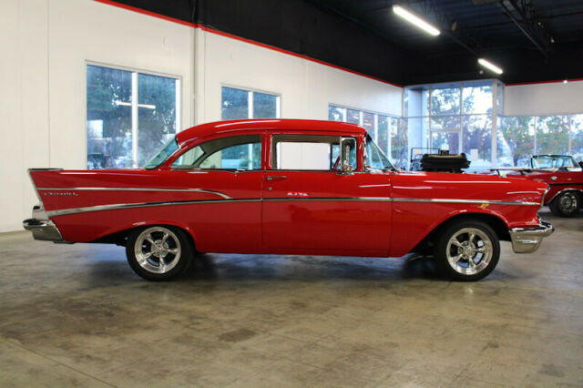 Red 1957 Chevrolet Bel Air/150/210 Sedan with Red interior