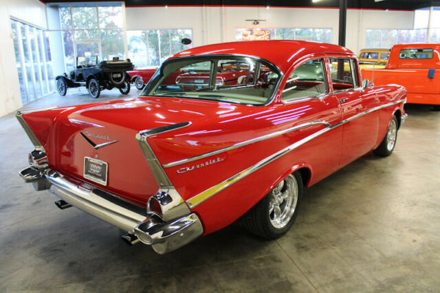 Red 1957 Chevrolet Bel Air/150/210 Sedan with Red interior