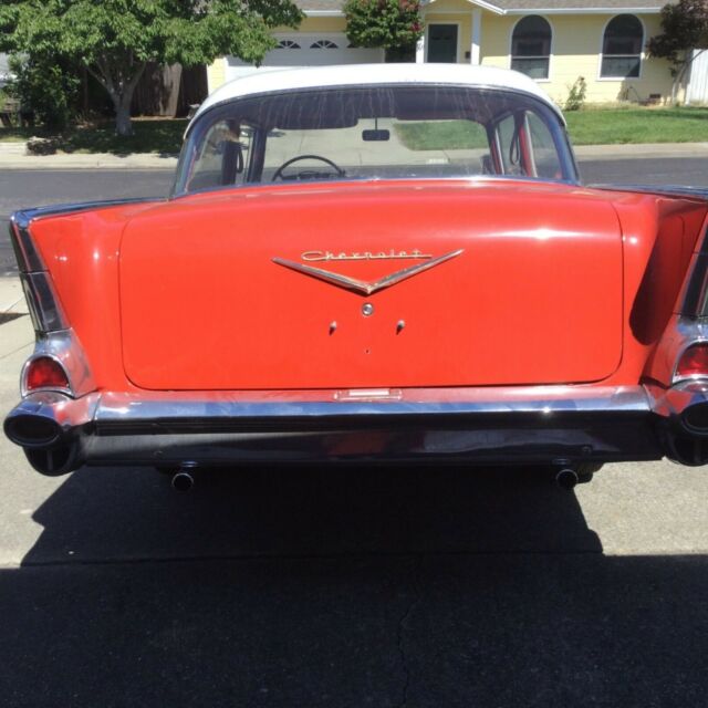 Red/White 1957 Chevrolet Bel Air/150/210 Coupe with Red/black interior
