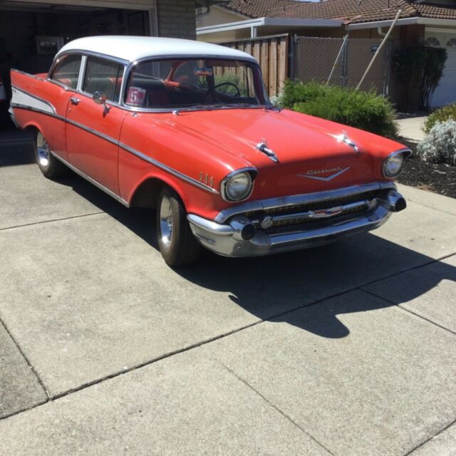 Red/White 1957 Chevrolet Bel Air/150/210 Coupe with Red/black interior