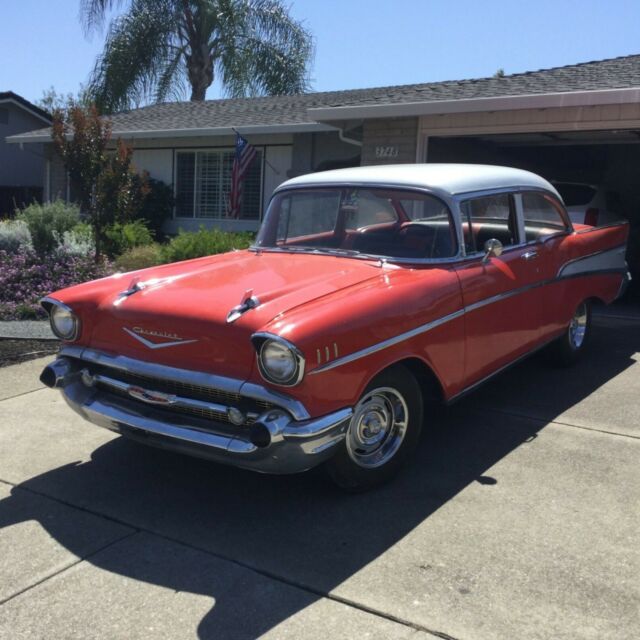 Red/White 1957 Chevrolet Bel Air/150/210 Coupe with Red/black interior