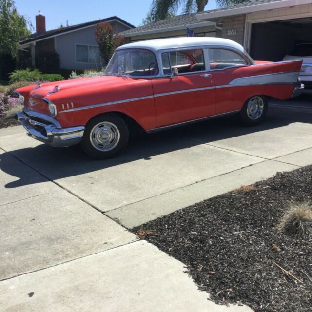 Red/White 1957 Chevrolet Bel Air/150/210 Coupe with Red/black interior