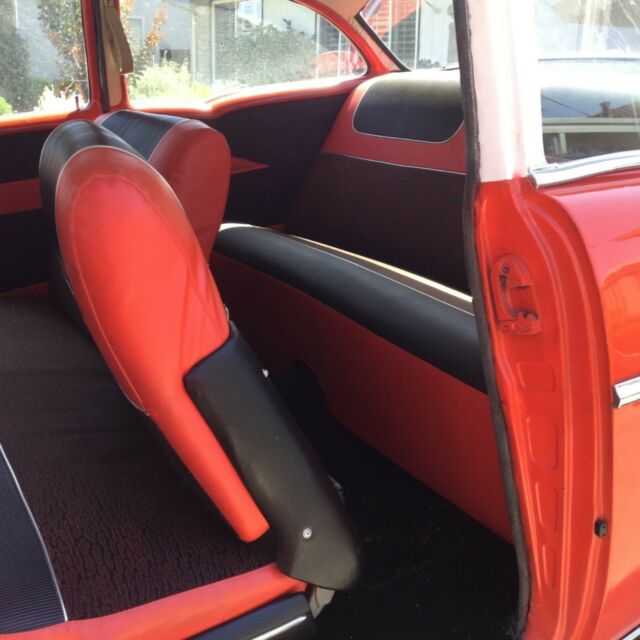 Red/White 1957 Chevrolet Bel Air/150/210 Coupe with Red/black interior