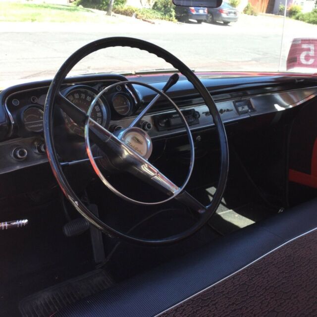 Red/White 1957 Chevrolet Bel Air/150/210 Coupe with Red/black interior