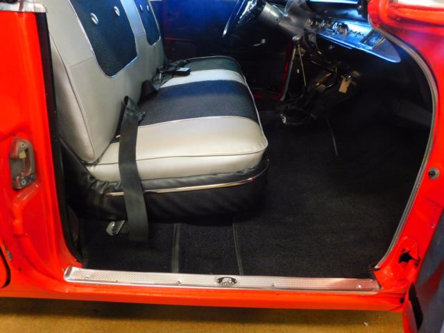 Red 1957 Chevrolet Bel Air/150/210 Sedan