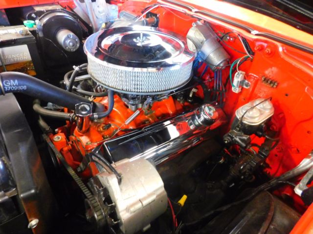 Red 1957 Chevrolet Bel Air/150/210 Sedan