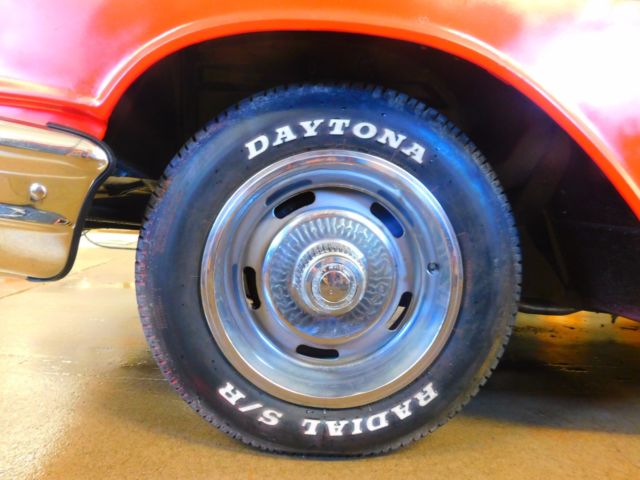 Red 1957 Chevrolet Bel Air/150/210 Sedan