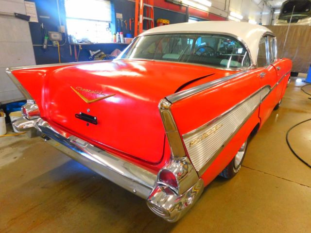 Red 1957 Chevrolet Bel Air/150/210 Sedan