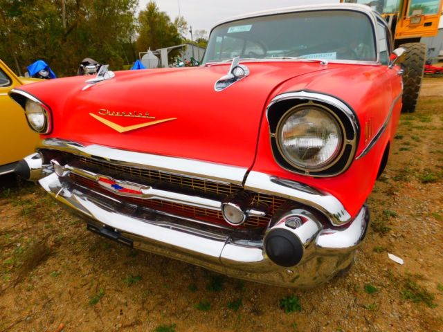 Red 1957 Chevrolet Bel Air/150/210 Sedan