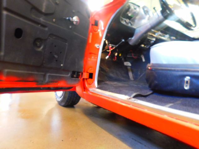 Red 1957 Chevrolet Bel Air/150/210 Sedan
