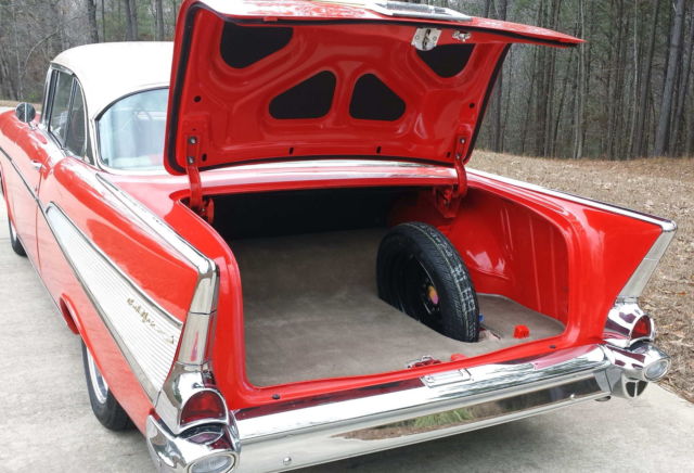 Red 1957 Chevrolet Bel Air/150/210 Coupe with Red interior