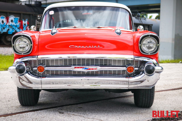 Red 1957 Chevrolet Bel Air/150/210 Coupe with Black interior