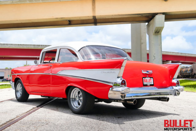 Red 1957 Chevrolet Bel Air/150/210 Coupe with Black interior