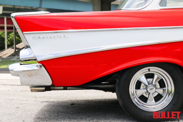 Red 1957 Chevrolet Bel Air/150/210 Coupe with Black interior