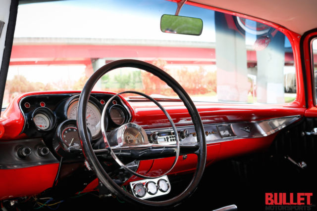 Red 1957 Chevrolet Bel Air/150/210 Coupe with Black interior