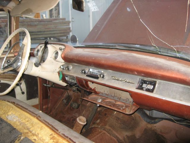 Siera Gold and Ivory 1957 Chevrolet Bel Air/150/210 Sedan with Black and Siera Gold interior