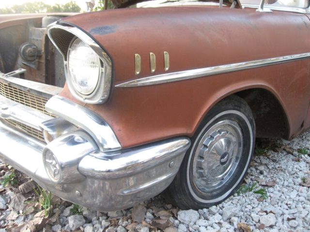 Siera Gold and Ivory 1957 Chevrolet Bel Air/150/210 Sedan with Black and Siera Gold interior
