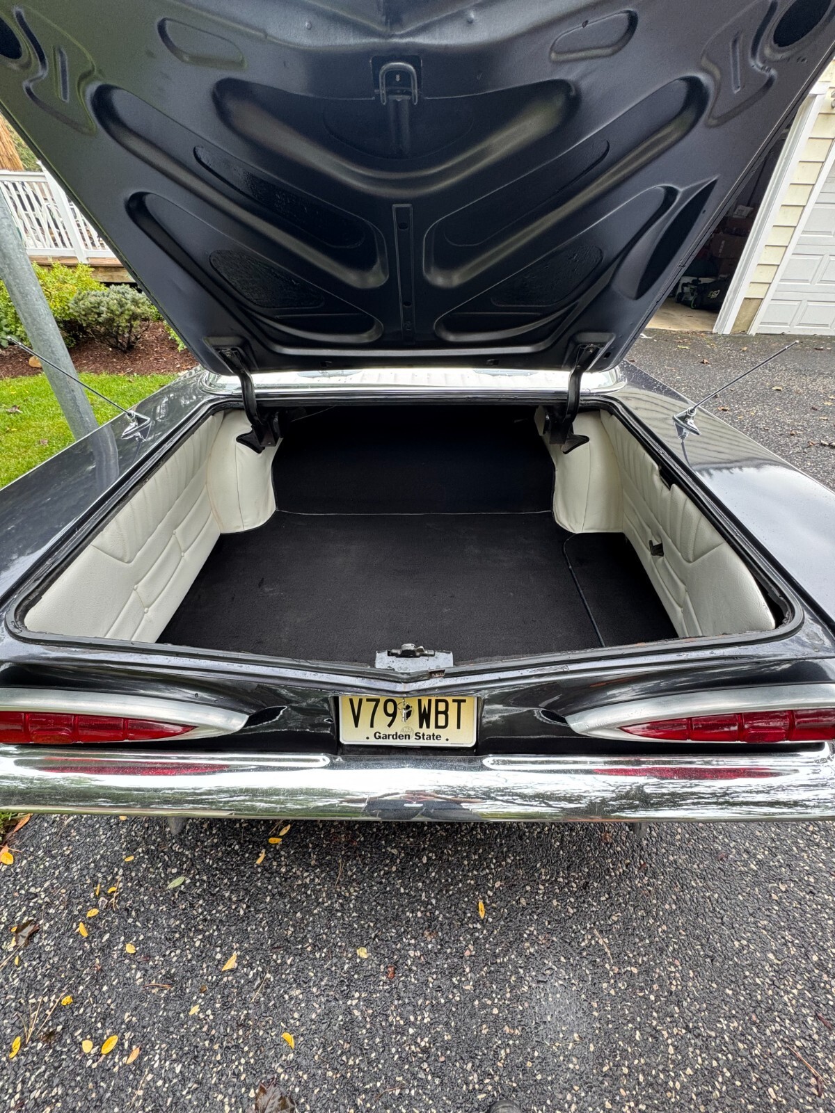 Black 1959 Chevrolet Bel Air/150/210 Coupe with White interior