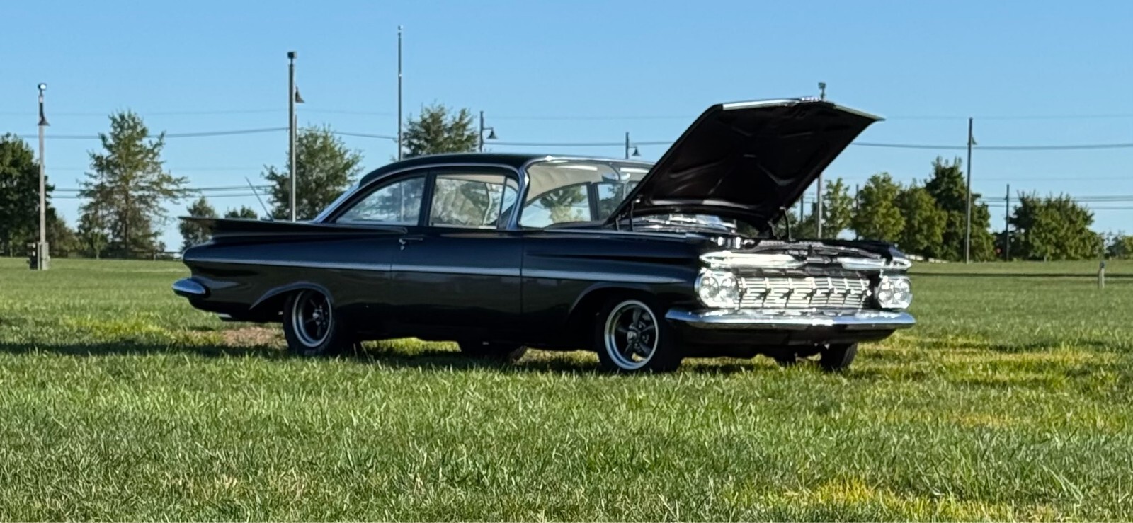 Black 1959 Chevrolet Bel Air/150/210 Coupe with White interior