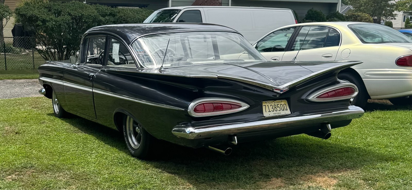Black 1959 Chevrolet Bel Air/150/210 Coupe with White interior
