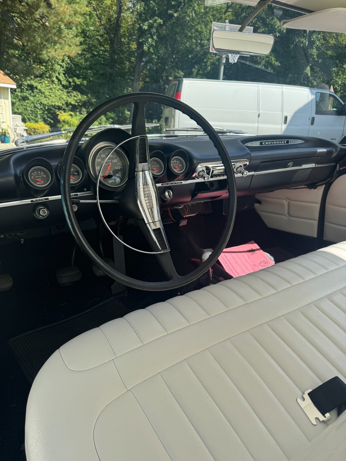 Black 1959 Chevrolet Bel Air/150/210 Coupe with White interior