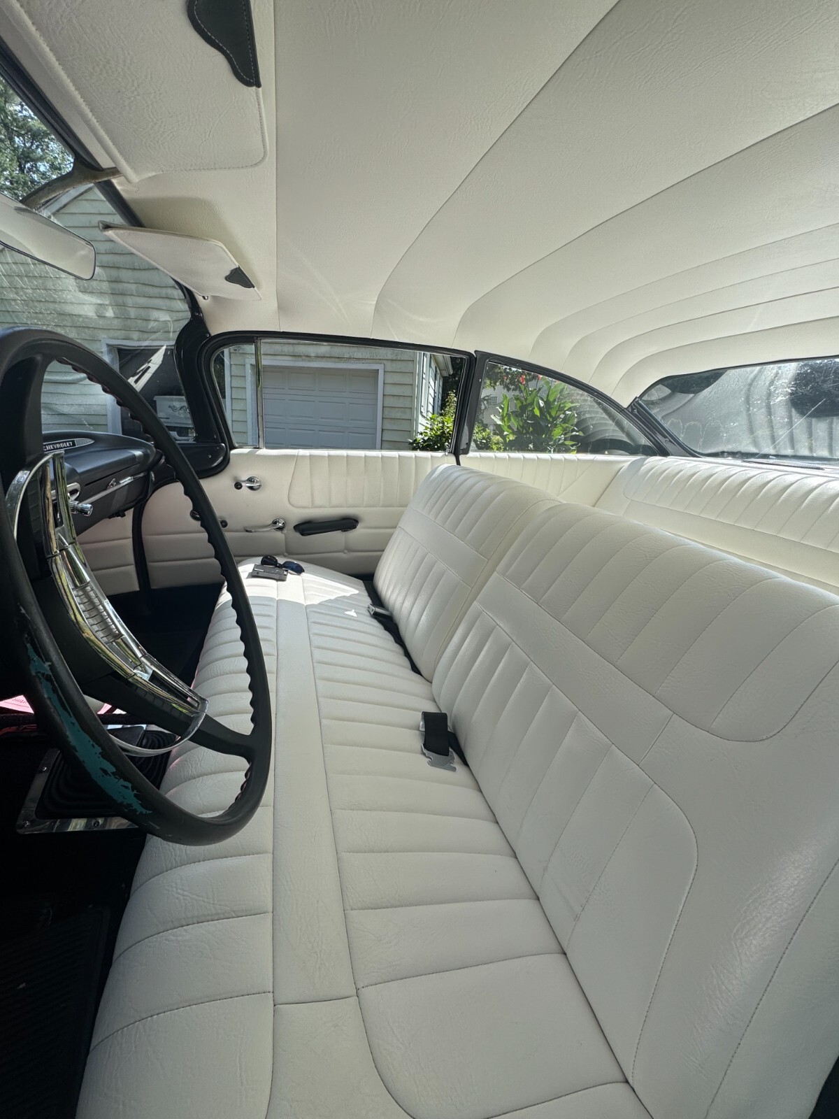 Black 1959 Chevrolet Bel Air/150/210 Coupe with White interior