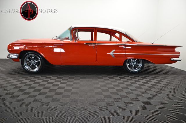 Red 1960 Chevrolet Bel Air/150/210 -- with White interior