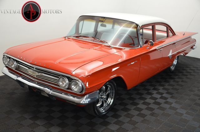 Red 1960 Chevrolet Bel Air/150/210 -- with White interior