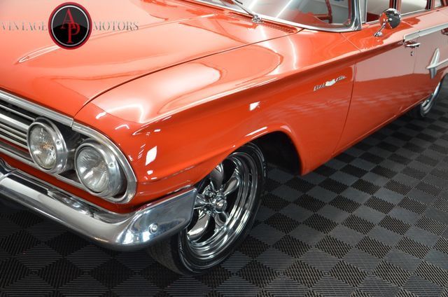 Red 1960 Chevrolet Bel Air/150/210 -- with White interior