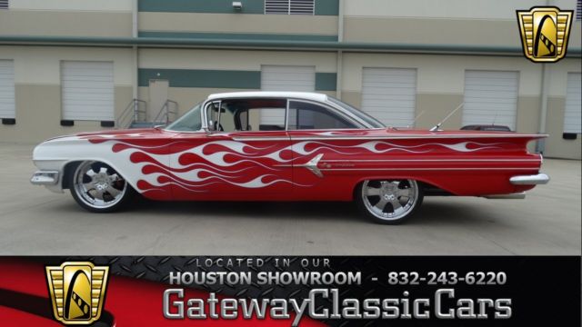Red 1960 Chevrolet Impala with Black interior