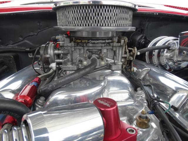 Red 1960 Chevrolet Impala with Black interior