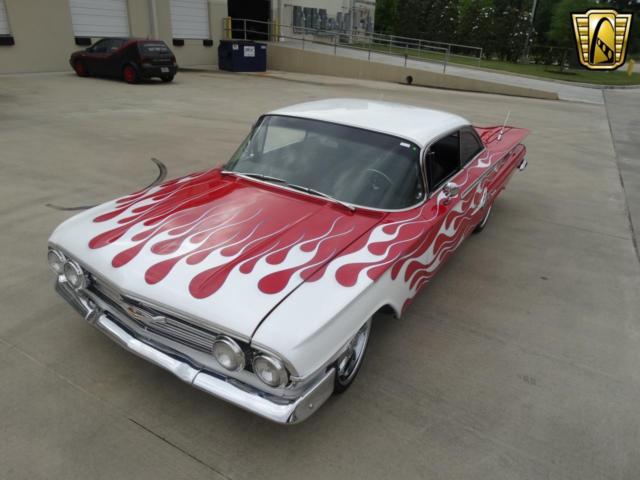 Red 1960 Chevrolet Impala with Black interior