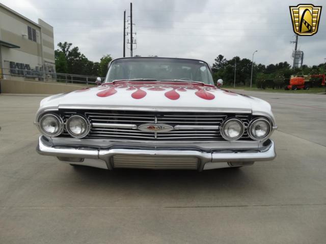 Red 1960 Chevrolet Impala with Black interior