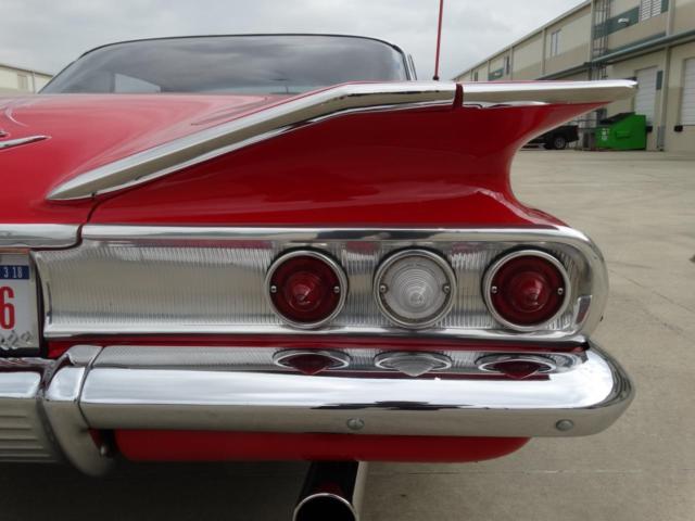 Red 1960 Chevrolet Impala with Black interior