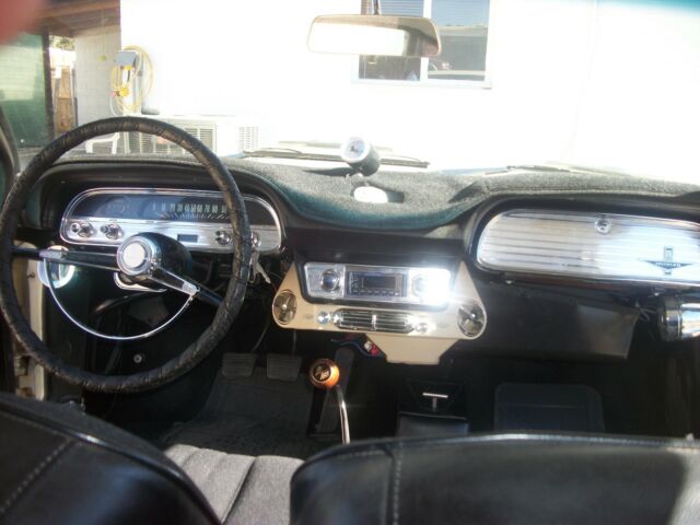 yellow 1962 Chevrolet Corvair coupe with Black interior