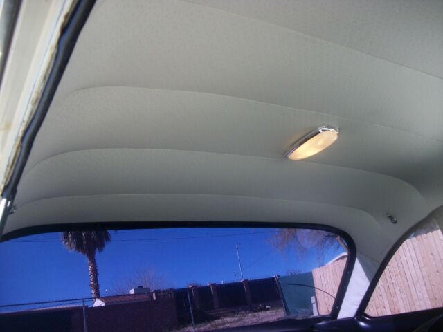 yellow 1962 Chevrolet Corvair coupe with Black interior