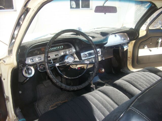 yellow 1962 Chevrolet Corvair coupe with Black interior