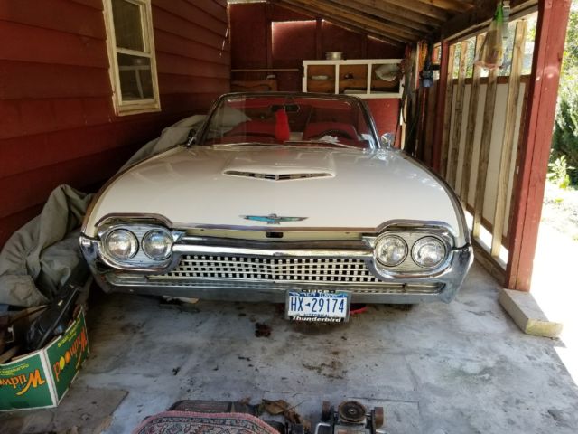 White 1962 Ford Thunderbird with Red interior