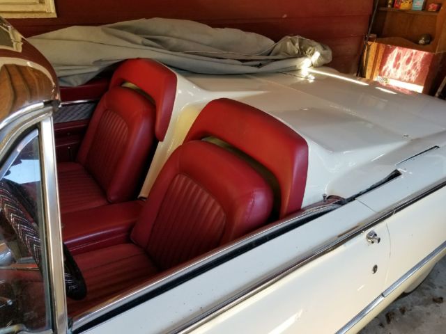 White 1962 Ford Thunderbird with Red interior