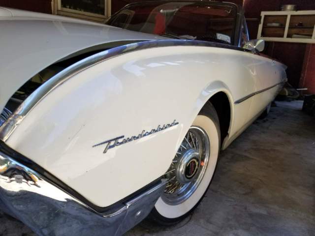 White 1962 Ford Thunderbird with Red interior