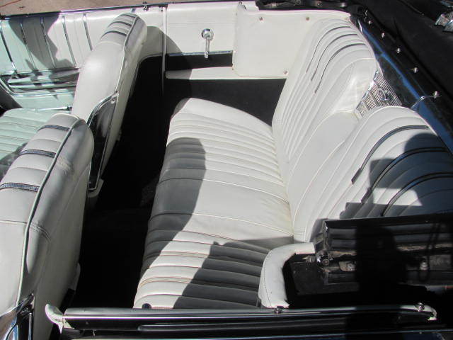 Blue 1963 Ford Galaxie Convertible with white interior
