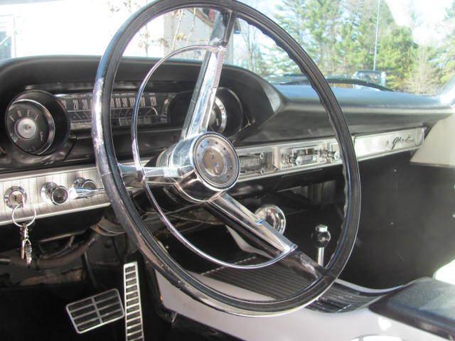 Blue 1963 Ford Galaxie Convertible with white interior