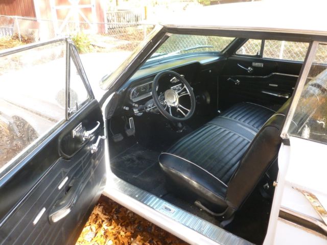 White 1964 Ford Fairlane Coupe with Black interior